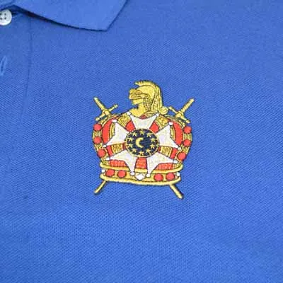 DeMolay crest embroidered on a royal blue polo
