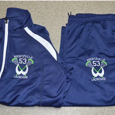 Wentzville Lacrosse logo embroidered on navy team warm-ups