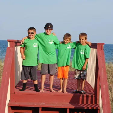 Kids wearing matching custom printed green t-shirts