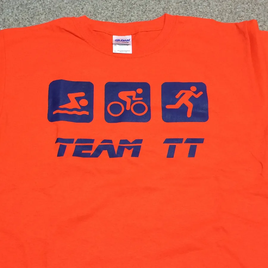 Team TT triathlon icons screen printed on an orange shirt