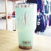 Vinyl monogram decal on a mint tumbler