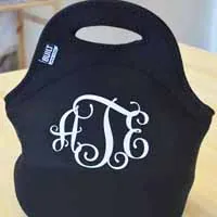 Glitter vinyl monogram on a navy lunch bag